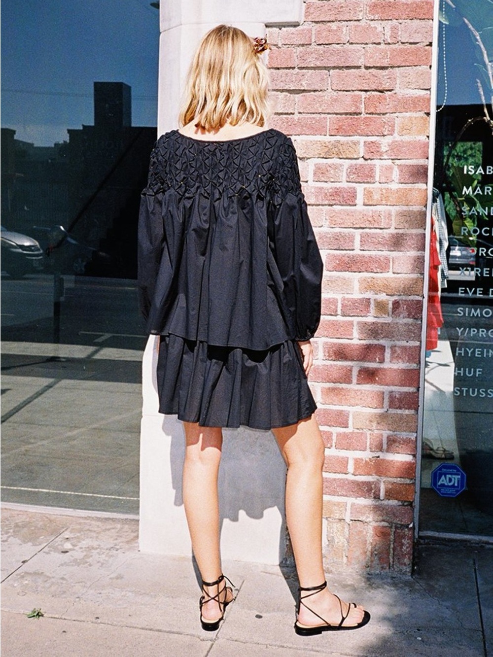 Merlette Songes Smocked Yoke Black Mini Skirt with Tiered Silhouette